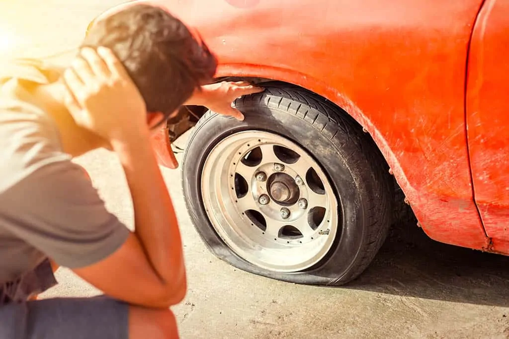 A customer stuck on the side of the road in Mays Landing with a flat tire.