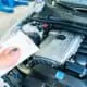 Mechanic reviewing customer vehicle in Mays Landing