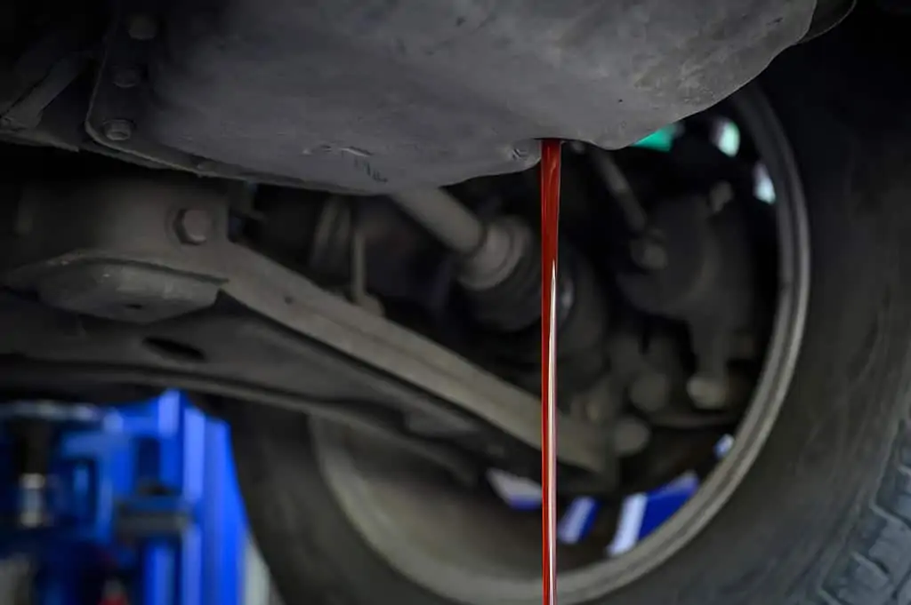 Performing a fluid flush on a customer's car in Mays Landing, NJ